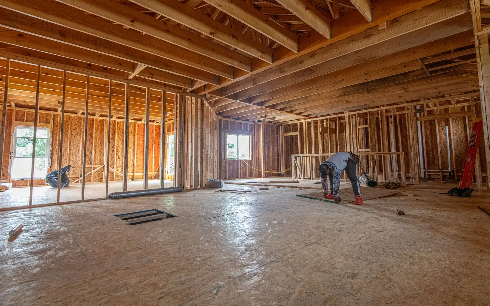Interior of a Texas home under construction with framing ready for drywall